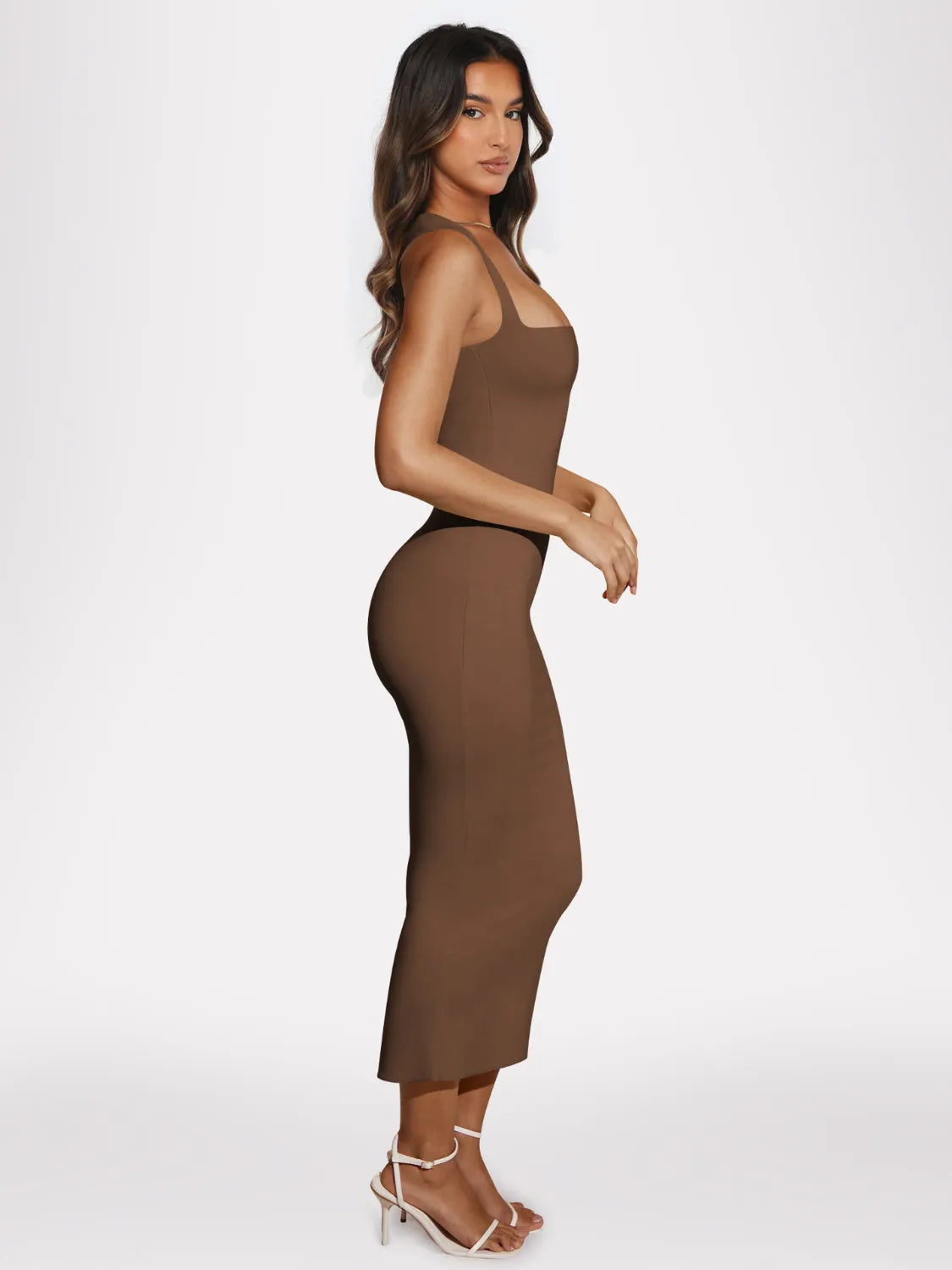 Women's mocha brown square-neck rib-knit bodycon midi dress with wide straps and kick-flare hem.