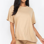 Women's oversized two-piece lounge set featuring a relaxed fit short-sleeve tee and high-waisted biker shorts, available in multiple vibrant colors. Perfect for casual wear, workouts, or athleisure style.