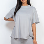 Women's oversized two-piece lounge set featuring a relaxed fit short-sleeve tee and high-waisted biker shorts, available in multiple vibrant colors. Perfect for casual wear, workouts, or athleisure style.