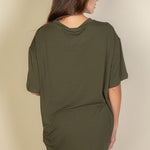 Women's oversized two-piece lounge set featuring a relaxed fit short-sleeve tee and high-waisted biker shorts, available in multiple vibrant colors. Perfect for casual wear, workouts, or athleisure style.