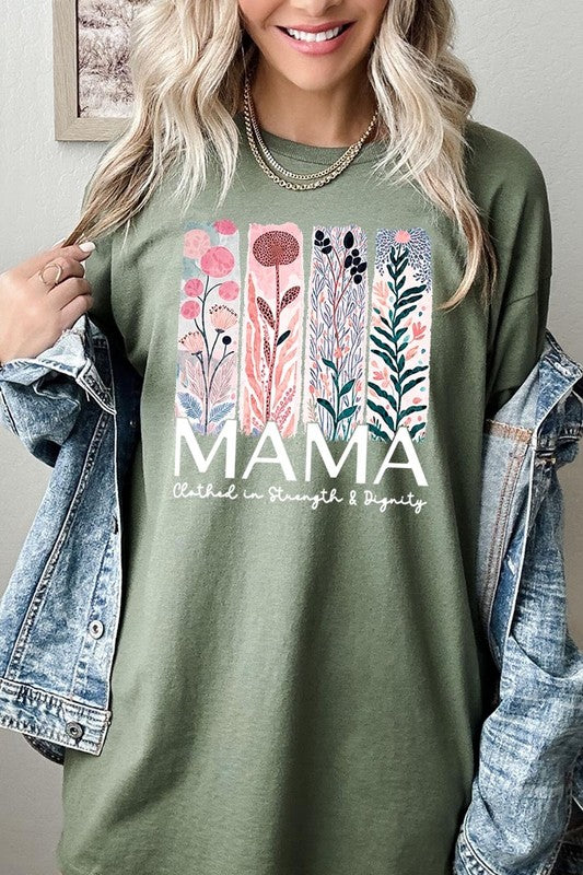 Green T-shirt with pastel pink and teal floral panel design and bold ‘MAMA’ graphic reading ‘Clothed in Strength & Dignity.