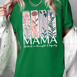 T-shirt with pastel pink and teal floral panel design and bold ‘MAMA’ graphic reading ‘Clothed in Strength & Dignity.