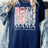T-shirt with pastel pink and teal floral panel design and bold ‘MAMA’ graphic reading ‘Clothed in Strength & Dignity.