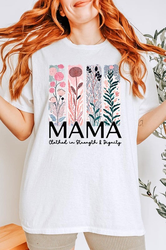 White T-shirt with pastel pink and teal floral panel design and bold ‘MAMA’ graphic reading ‘Clothed in Strength & Dignity.