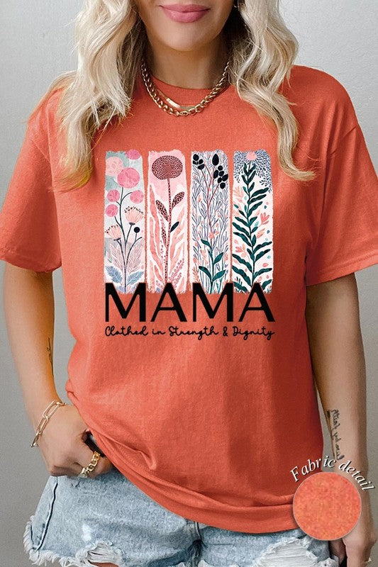 T-shirt with pastel pink and teal floral panel design and bold ‘MAMA’ graphic reading ‘Clothed in Strength & Dignity.