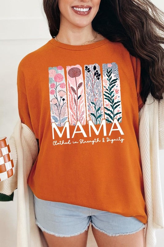 Orange T-shirt with pastel pink and teal floral panel design and bold ‘MAMA’ graphic reading ‘Clothed in Strength & Dignity.