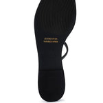 Women's handcrafted black crisscross flat sandals with minimalist strappy design by Rag & Co – stylish slip-on summer footwear.
