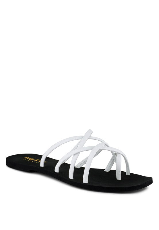Women's handcrafted White crisscross flat sandals with minimalist strappy design by Rag & Co – stylish slip-on summer footwear.