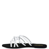 Women's handcrafted White crisscross flat sandals with minimalist strappy design by Rag & Co – stylish slip-on summer footwear.